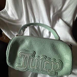Juicy Couture Light Green Clutch with Logo Embellishment